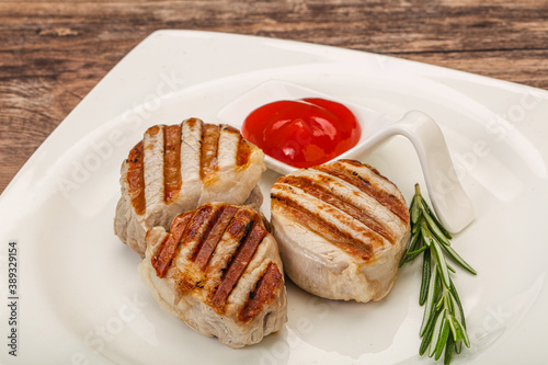 Grilled pork medallion with sauce