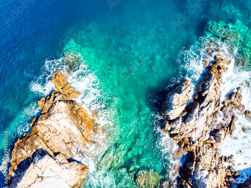 Drone aerial view of sea and rocks in Olympiada, Halkidiki, Gree