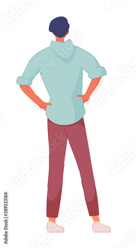 Man standing back holding hand on hip isolated on white