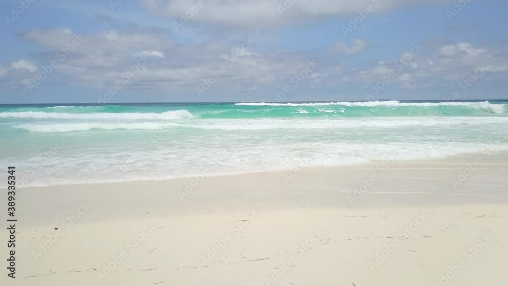 Hawaii beach. Paradise island. Big waves. Cristal clear turquoise water. Sand beach. Camera move forward to the water. Exellent place for rich people and celebrities. Pacific ocean. Blue ocean white Hawaii beach. Paradise island. Big waves. Cristal clear turquoise water. Sand beach. Camera move forward to the water. Exellent place for rich people and celebrities. Pacific ocean. Blue ocean white