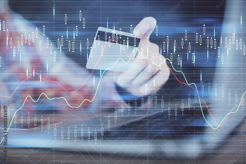 Double exposure of man hands holding a credit card and Forex graph drawing. Stock trading and digital fintech in Internet E-commerce concept. Double exposure of man hands holding a credit card and Forex graph drawing. Stock trading and digital fintech in Internet E-commerce concept.