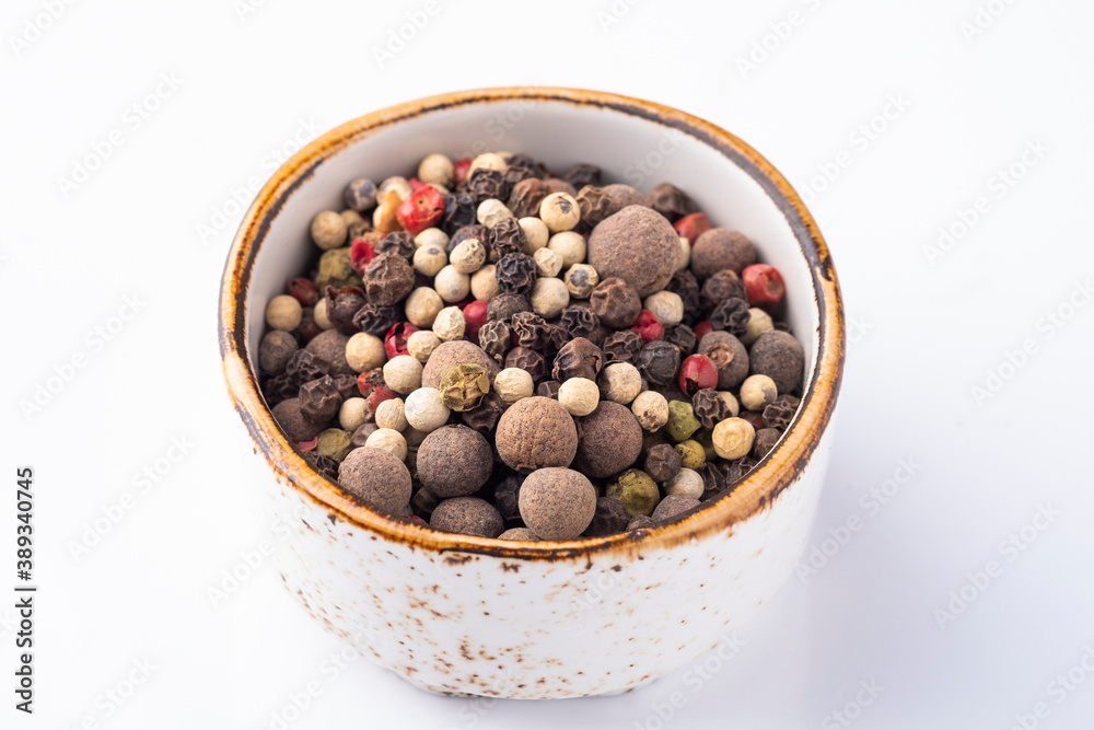 Pepper mix in a bowl on white background Pepper mix in a bowl on white background