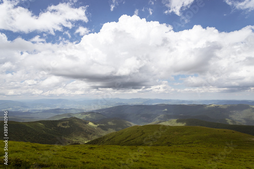 Fototapeta Naklejka Na Ścianę i Meble -  Beautiful mountain landscape with beautiful clouds. The Carpathians.