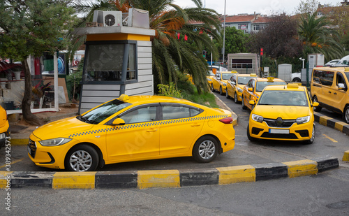 Vehicles waiting at the taxi stand front view. © bahadirbermekphoto