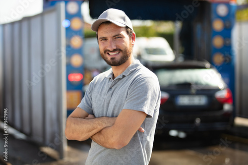 carwash worker posing for the camera