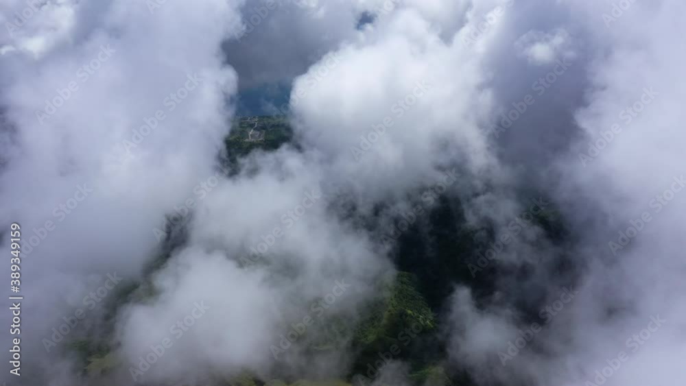 Clouds over Martinique highest volcano mountain Pelee aerial view sunny day geology scenery Clouds over Martinique highest volcano mountain Pelee aerial view sunny day geology scenery