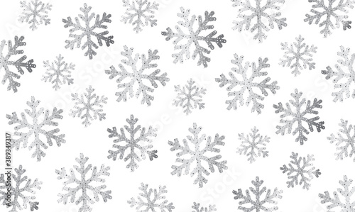 Background texture with silver snowflakes on white backdrop, illustration made of shiny particles