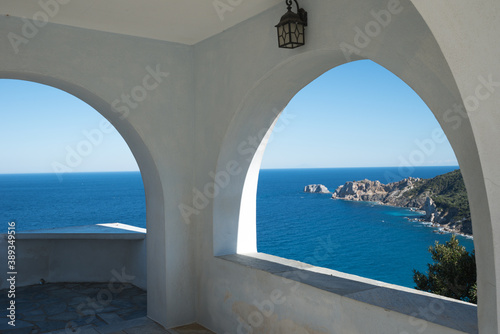 Fototapeta Naklejka Na Ścianę i Meble -  Small church near the sea, Skiathos island, Greece, design architecture.