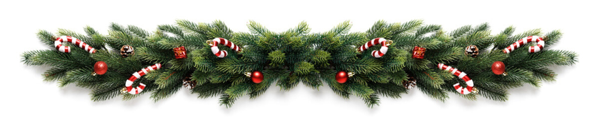 Christmas border frame of tree branches with red balls, pine cones and candies