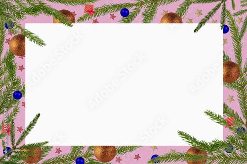 Branches ate and Christmas decorations around the frame of the white background, a Christmas card or a greeting.