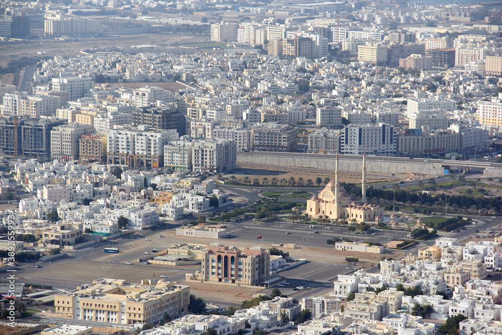 View to mosque and surroundings buildings from the hill during  the day.