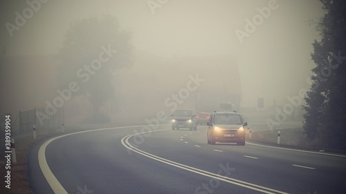 Photos Car on the road in the fog