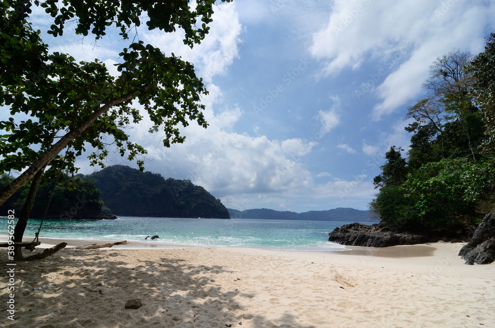 Fototapeta premium Beautiful sandy beach at Teluk Hijau (Green Bay). It is about 90 kilometer from Banyuwangi in East Java, Indonesia.