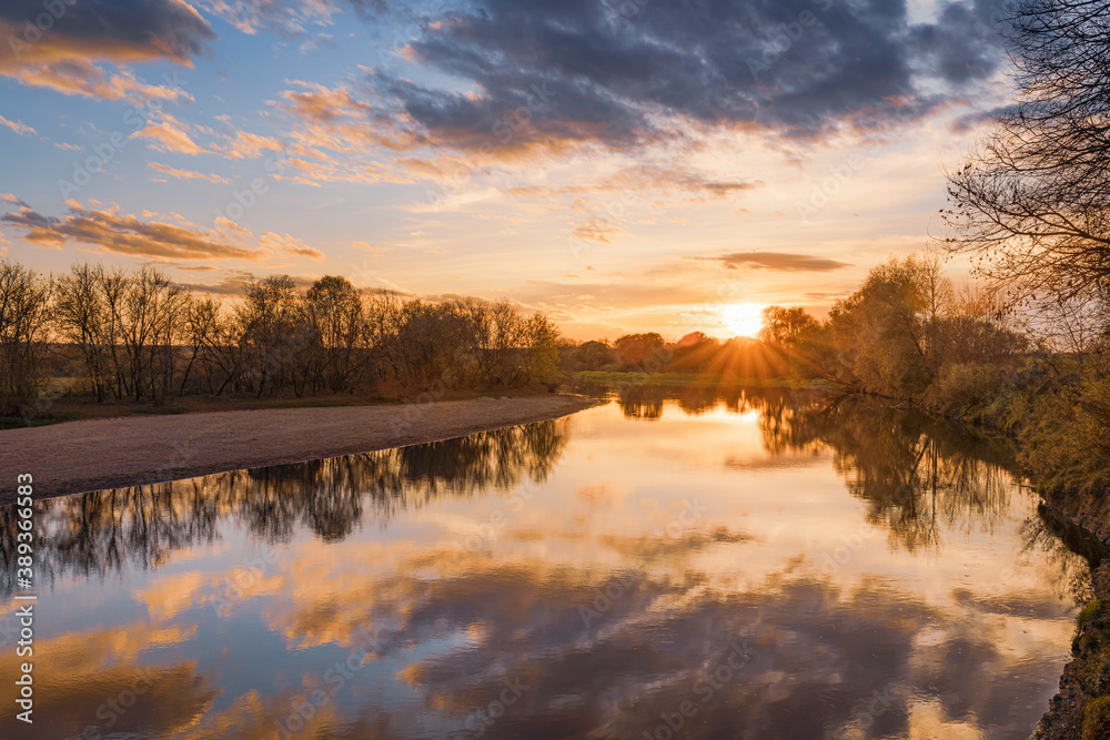 Autumn sunrise over the river in Moscow Region, Russia