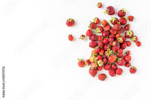 Sweet strawberries on white background with copyspace. Real food concept