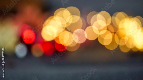 defocused blur bokeh of city lights at night abstract background
