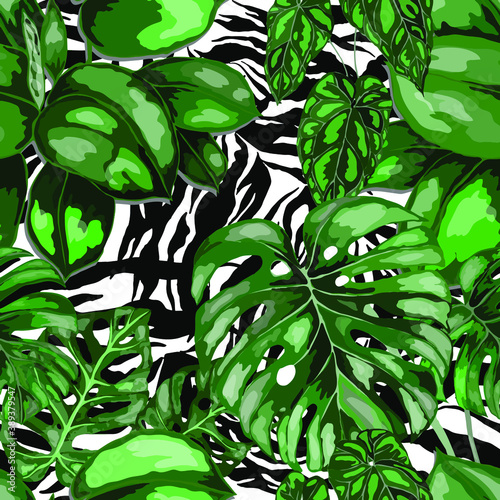Tropical seamless pattern on animalistic texture. Jungle exotic summer print. Summer tropical leaf. Tropical flower fashion pattern. Floral tropic illustration. Vector seamless pattern.	