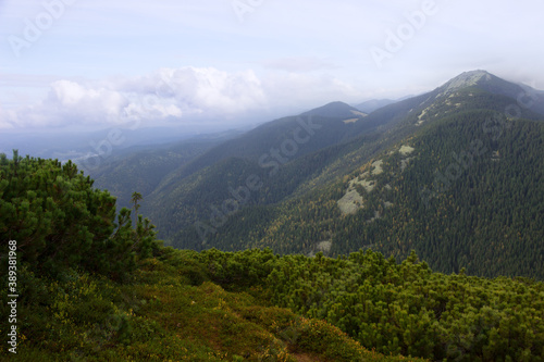 View from the mountain peak, beautiful nature landscape. Tourism, travel, climbing, hiking, active leisure concept
