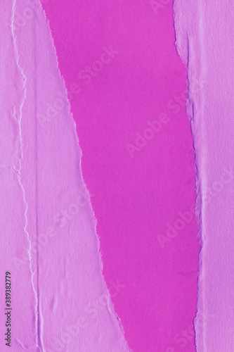 Blue and violet torn paper collage close-up. Texture made from various paper and cardboard parts. Damaged old paper background. Vintage blank wallpaper. Material design backdrop.