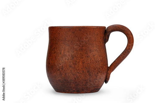 brown handmade clay mug, isolate on a white background