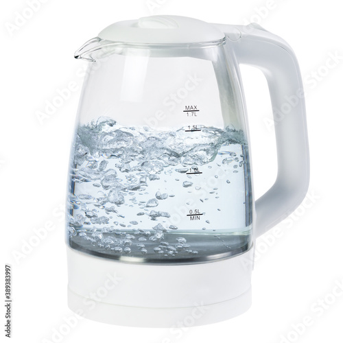 White glass electric kettle with boiling water isolated on white