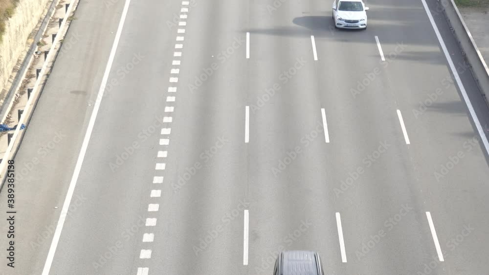 4K footage of traffic in multiple lane highway near Barcelona, Catalonia

