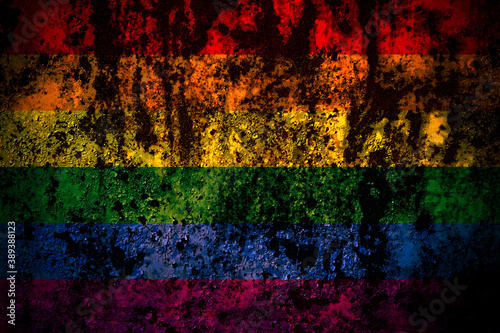 Gay, Pride flag on grunge metal background texture with scratches and cracks