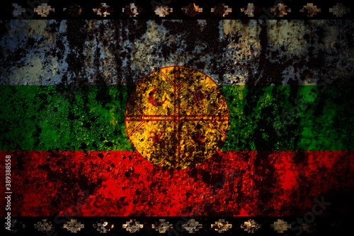 Mapuches flag on grunge metal background texture with scratches and cracks