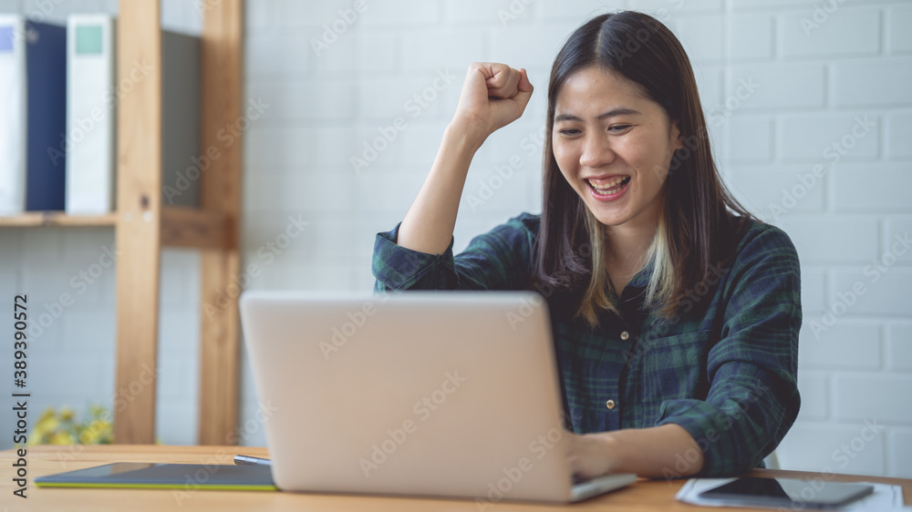 Asian women working at home using a lab. Graphic design. Working with pleasure. Concept work at home. Asian women working at home using a lab. Graphic design. Working with pleasure. Concept work at home.