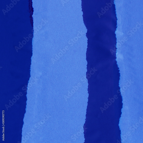 Wallpaper Mural Blue and violet torn paper collage close-up. Texture made from various paper and cardboard parts. Damaged old paper background. Vintage blank wallpaper. Material design backdrop. Torontodigital.ca