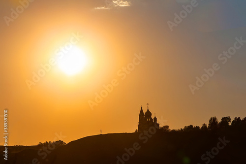 background, church silhouette on sunset sky background, copy space