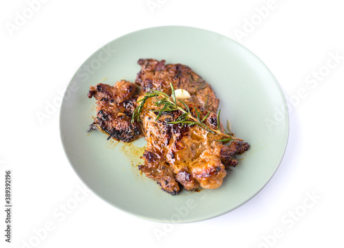 grilled beef steak and rosemary isolated on white background