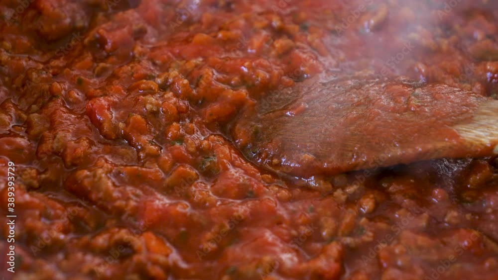 tomato sauce and minced beef cooking- bolognese sauce tomato sauce and minced beef cooking- bolognese sauce