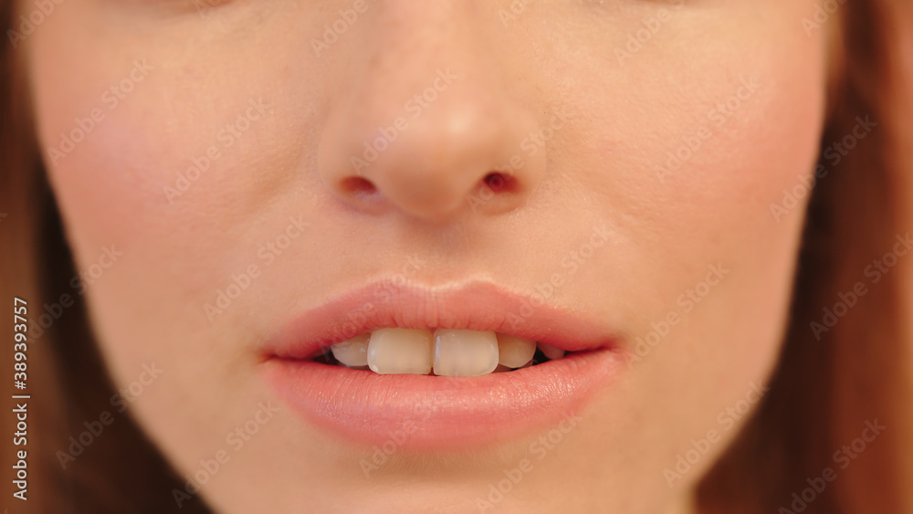 Obraz premium Beautiful wide smile of young fresh woman with great healthy white teeth. High quality photo