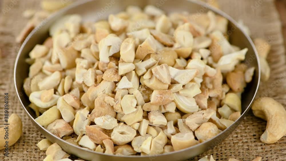 Chopped Cashew Nuts on a rotating plate (seamless loopable) Chopped Cashew Nuts on a rotating plate (seamless loopable)