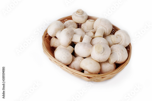 Fresh champignon mushrooms on white, isolated, closeup. Space for text