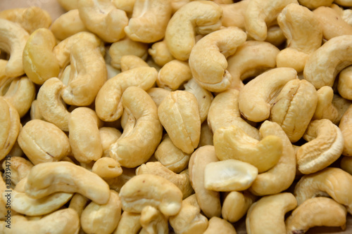 Cashew nuts. Cashew kernels. Clean organic nuts retro background. Organic healthy food.