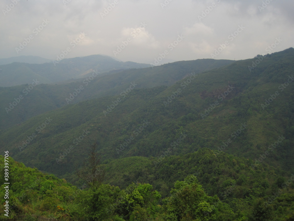 Obraz premium Backpacking down the Mekong river and the jungle landscapes of Laos in Southeast Asia
