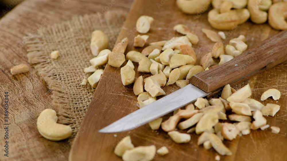 Chopped Cashew Nuts on a rotating plate (seamless loopable) Chopped Cashew Nuts on a rotating plate (seamless loopable)