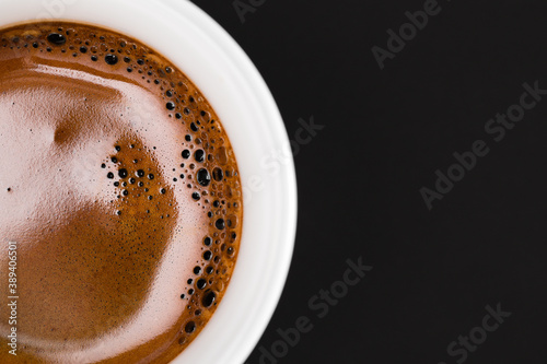 Espresso coffee crema closeup. © mallmo