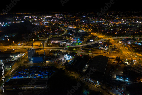 Fototapeta Naklejka Na Ścianę i Meble -  Night time aerial photo of the the town centre of Leeds in the UK, showing the West Yorkshire British city from above in the evening time