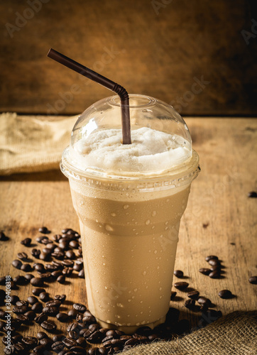 Iced Coffee on wooden table photo