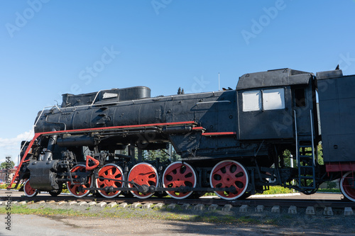 Old steam locomotive at the railway station.