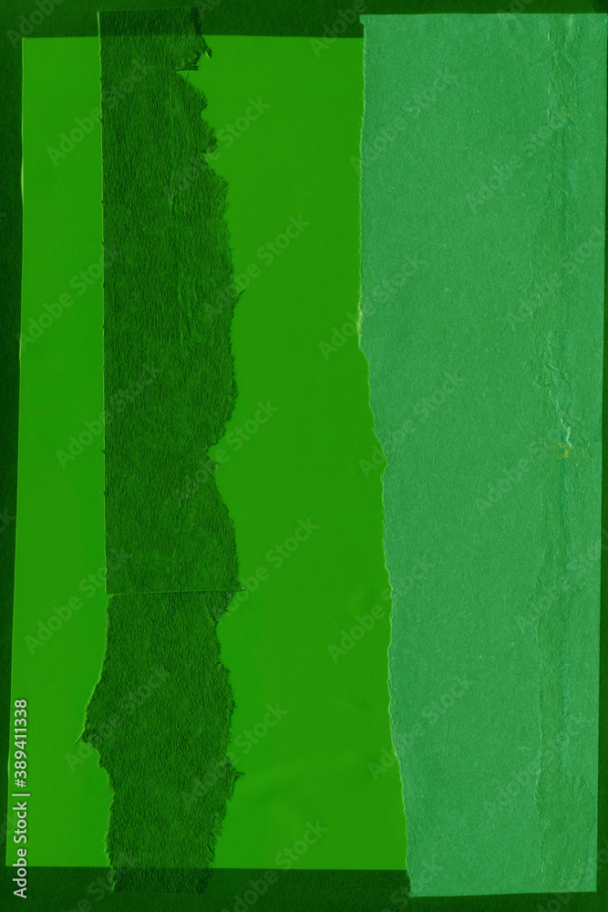 Green torn paper collage close-up. Texture made from various paper and cardboard parts. Damaged old paper background. Vintage blank wallpaper. Material design backdrop. Green torn paper collage close-up. Texture made from various paper and cardboard parts. Damaged old paper background. Vintage blank wallpaper. Material design backdrop.