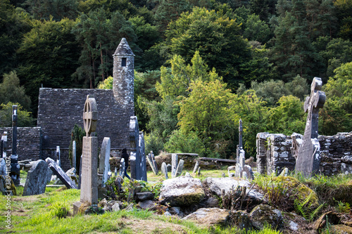 GLENDALOUGH, WICKLOW COUNTY, IRELAND - SEPTEMBER 12, 2018: Cemetery at Glendalough's monastic city. Early Medieval monastic settlement founded in the 6th century by St Kevin.