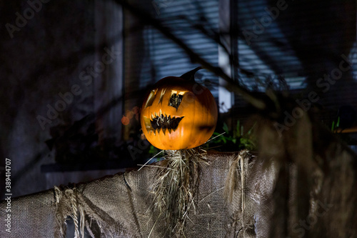 Scary Halloween Scarecrow Casting a Shadow against wall