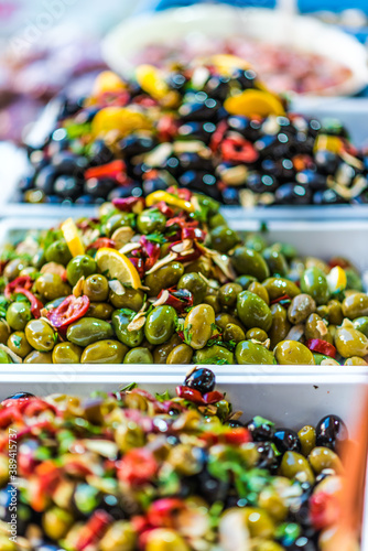 Assorted olives put up for sale on the italian street stall