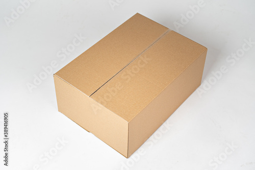 Brown carton box on a white background photo
