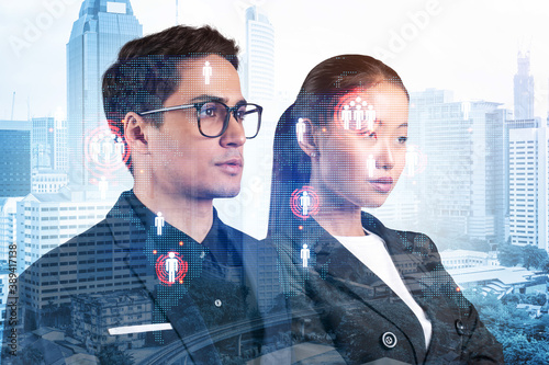 Canvas Print Businessman and businesswoman as a SMM specialists thinking about development of social media marketing strategy to achieve business goals