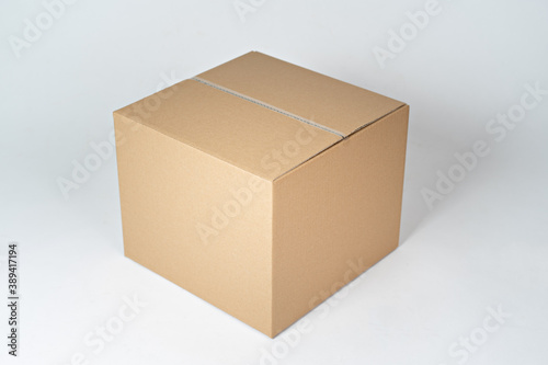 Brown carton box on a white background